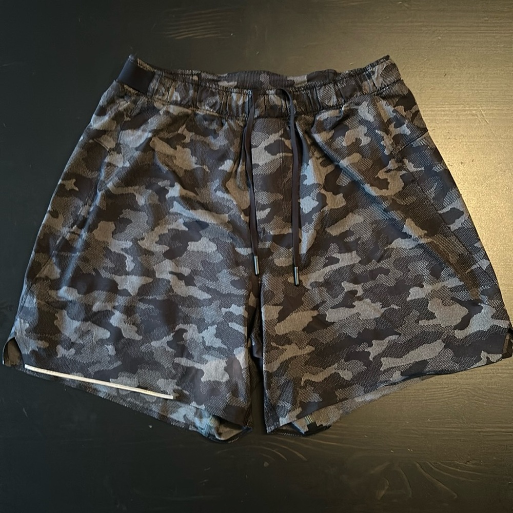 Lulu lemon men’s shorts with liner.  Preowned
